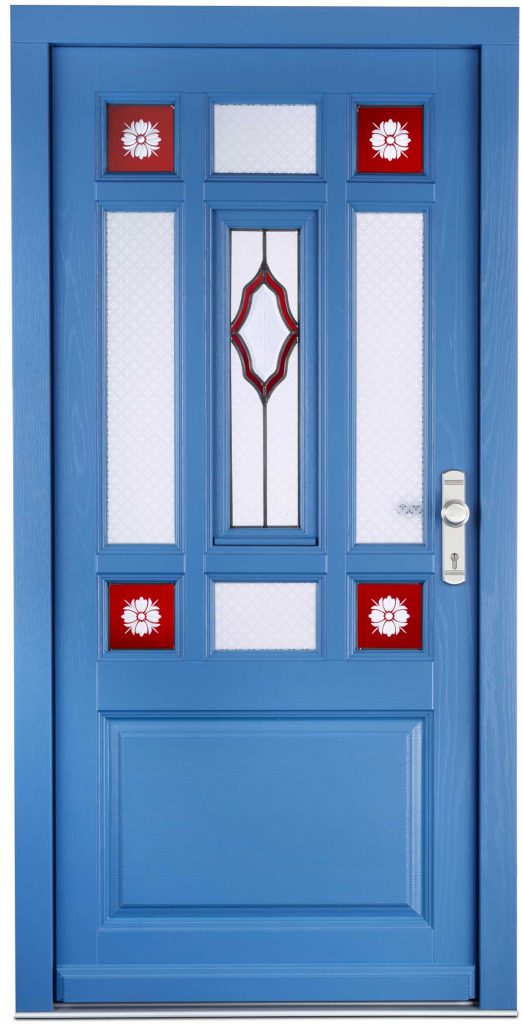 LANDHAUSTÜR mit neun Glasfeldern, vier Friesenecken, farbliche Gestaltung nach Kundenwunsch. Klönflügel mit Bleiverglasung und einer Kassette im unteren Bereich.